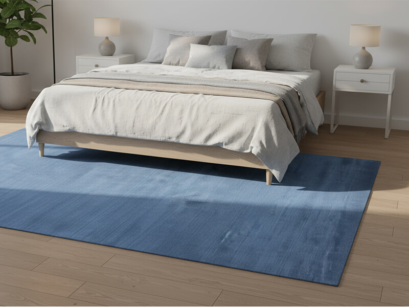 Close-up of soft hand-knotted wool bedroom rug fibers
