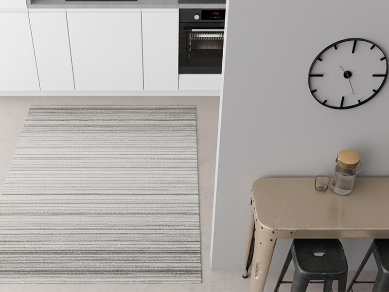Hand-knotted wool runner rug in a modern white kitchen