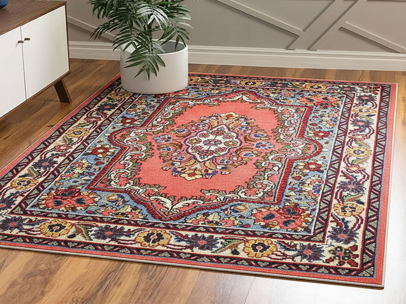 Traditional Sarough carpet featuring elegant floral vines and rich red tones